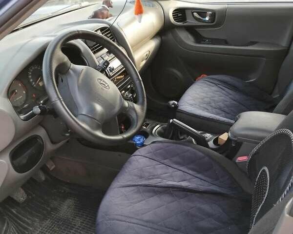Синий Хендай Санта Фе, объемом двигателя 2 л и пробегом 232 тыс. км за 6800 $, фото 1 на Automoto.ua