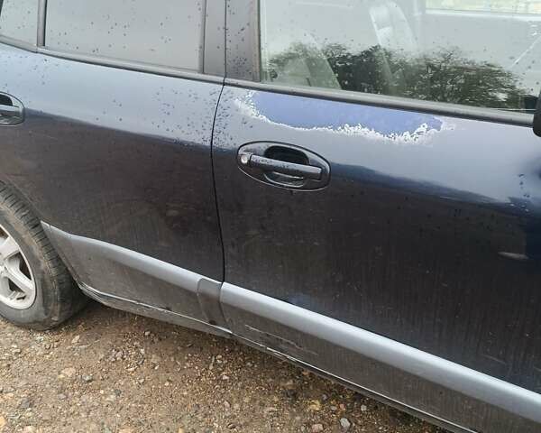 Синий Хендай Санта Фе, объемом двигателя 2.35 л и пробегом 346 тыс. км за 4700 $, фото 1 на Automoto.ua