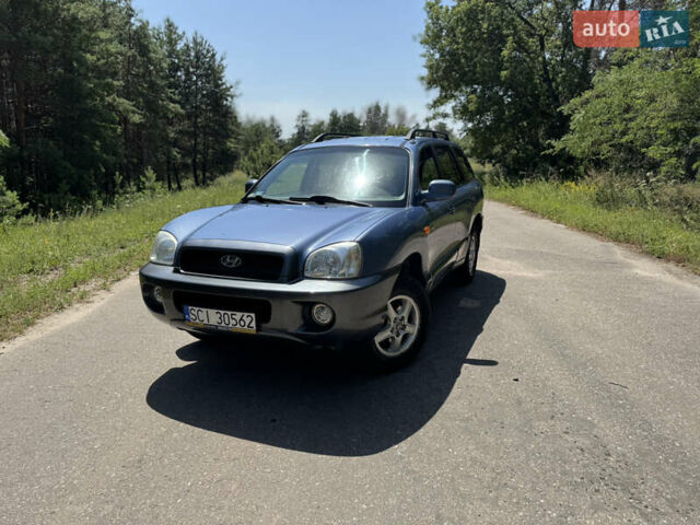 Синий Хендай Санта Фе, объемом двигателя 2 л и пробегом 225 тыс. км за 4800 $, фото 1 на Automoto.ua