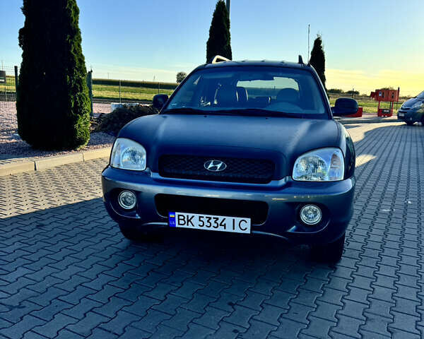Синий Хендай Санта Фе, объемом двигателя 2.35 л и пробегом 240 тыс. км за 5300 $, фото 1 на Automoto.ua