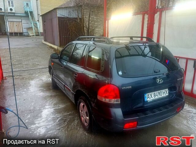 Синий Хендай Санта Фе, объемом двигателя 2 л и пробегом 280 тыс. км за 6300 $, фото 1 на Automoto.ua