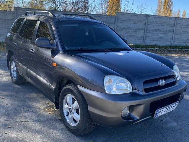 Синій Хендай Санта Фе, об'ємом двигуна 2.7 л та пробігом 257 тис. км за 5750 $, фото 1 на Automoto.ua