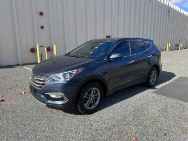 Синий Хендай Санта Фе, объемом двигателя 2.4 л и пробегом 61 тыс. км за 9100 $, фото 1 на Automoto.ua