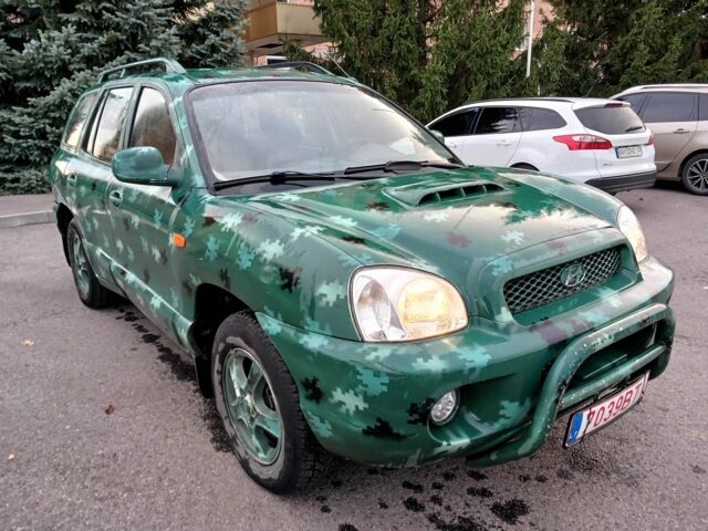 Зеленый Хендай Санта Фе, объемом двигателя 2 л и пробегом 287 тыс. км за 2750 $, фото 1 на Automoto.ua