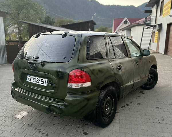 Зеленый Хендай Санта Фе, объемом двигателя 2.35 л и пробегом 223 тыс. км за 4500 $, фото 1 на Automoto.ua