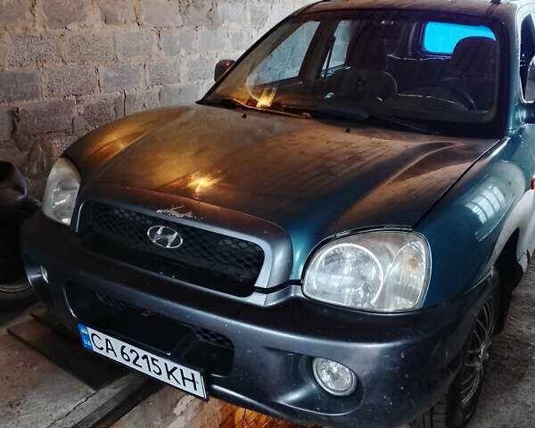 Зеленый Хендай Санта Фе, объемом двигателя 2 л и пробегом 300 тыс. км за 4200 $, фото 1 на Automoto.ua