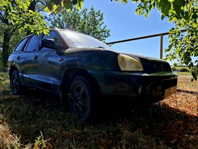 Зеленый Хендай Санта Фе, объемом двигателя 2.7 л и пробегом 250 тыс. км за 3100 $, фото 1 на Automoto.ua