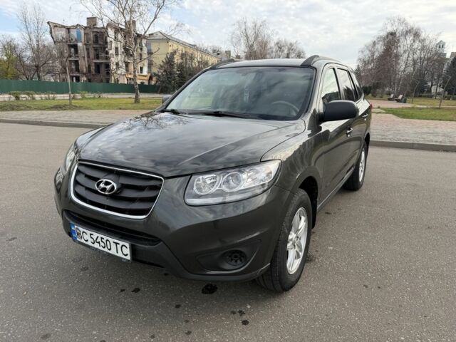 Зеленый Хендай Санта Фе, объемом двигателя 2.4 л и пробегом 180 тыс. км за 9800 $, фото 1 на Automoto.ua