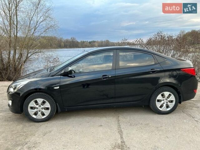 Черный Хендай Соларис, объемом двигателя 1.4 л и пробегом 41 тыс. км за 10900 $, фото 1 на Automoto.ua
