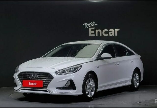 Белый Хендай Соната, объемом двигателя 2 л и пробегом 154 тыс. км за 11700 $, фото 1 на Automoto.ua