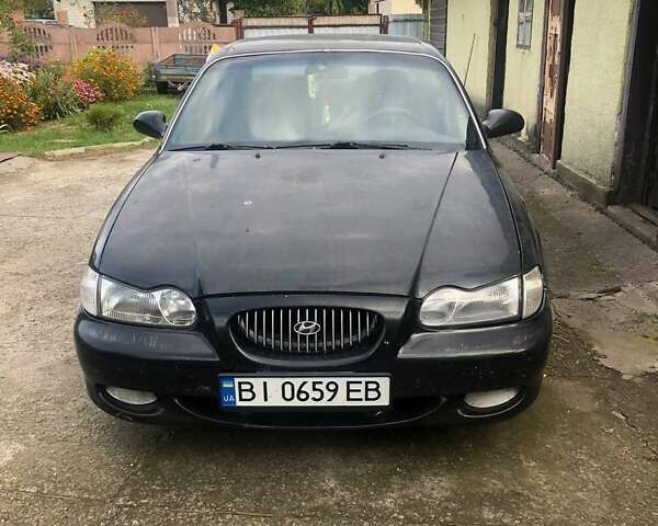 Чорний Хендай Соната, об'ємом двигуна 2 л та пробігом 400 тис. км за 2000 $, фото 1 на Automoto.ua
