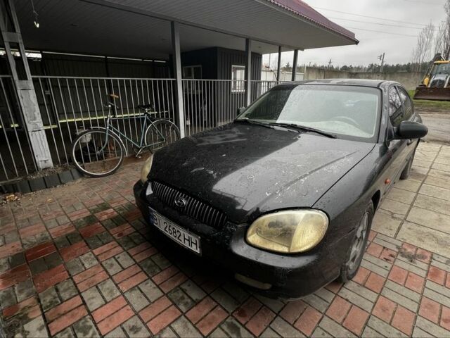 Черный Хендай Соната, объемом двигателя 2 л и пробегом 400 тыс. км за 1543 $, фото 1 на Automoto.ua