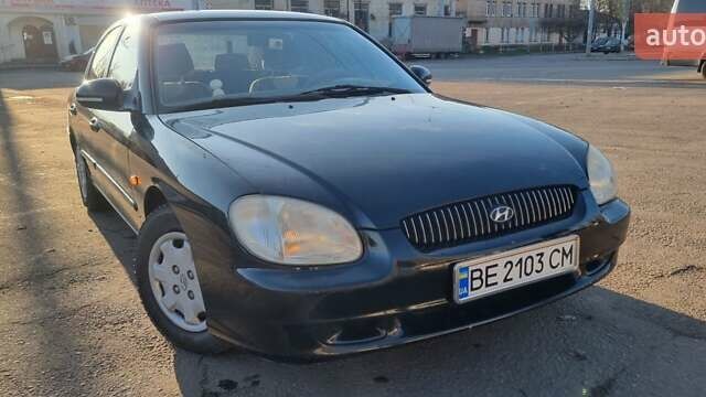 Черный Хендай Соната, объемом двигателя 2 л и пробегом 241 тыс. км за 2600 $, фото 1 на Automoto.ua