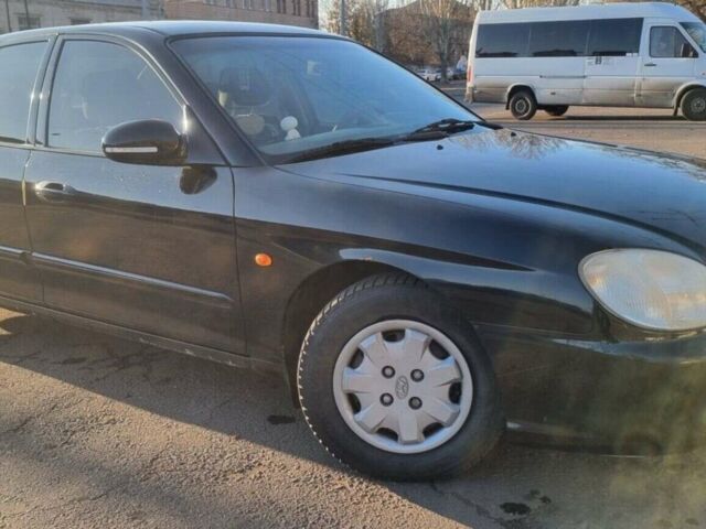 Черный Хендай Соната, объемом двигателя 2 л и пробегом 241 тыс. км за 2300 $, фото 1 на Automoto.ua