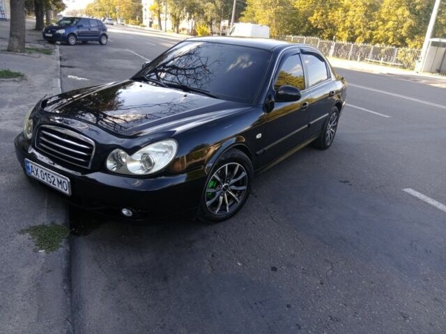 Черный Хендай Соната, объемом двигателя 2 л и пробегом 370 тыс. км за 4300 $, фото 1 на Automoto.ua