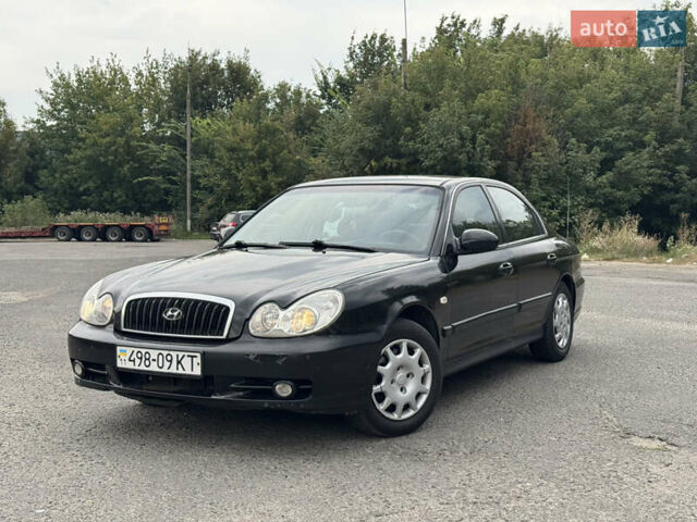 Черный Хендай Соната, объемом двигателя 2 л и пробегом 287 тыс. км за 2200 $, фото 1 на Automoto.ua