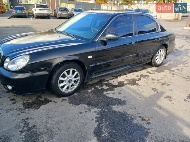 Черный Хендай Соната, объемом двигателя 2 л и пробегом 345 тыс. км за 2900 $, фото 1 на Automoto.ua