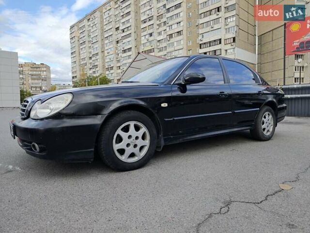 Черный Хендай Соната, объемом двигателя 2 л и пробегом 307 тыс. км за 2850 $, фото 1 на Automoto.ua