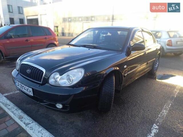 Черный Хендай Соната, объемом двигателя 2 л и пробегом 381 тыс. км за 3400 $, фото 1 на Automoto.ua