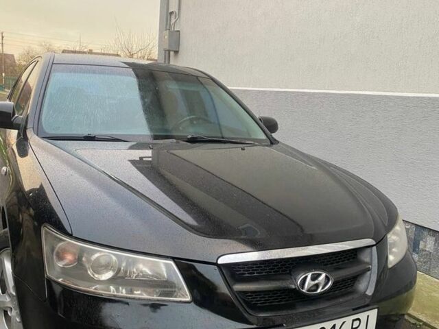 Чорний Хендай Соната, об'ємом двигуна 2.4 л та пробігом 260 тис. км за 4400 $, фото 1 на Automoto.ua