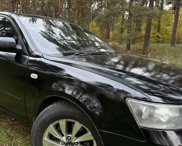 Черный Хендай Соната, объемом двигателя 2 л и пробегом 266 тыс. км за 6000 $, фото 1 на Automoto.ua