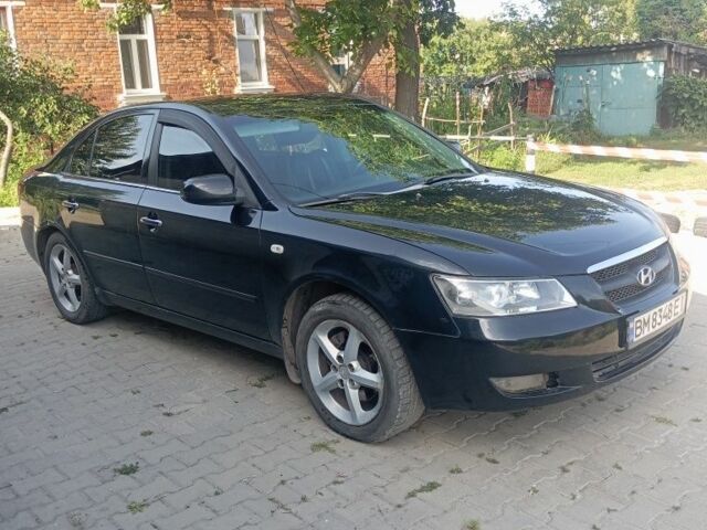 Чорний Хендай Соната, об'ємом двигуна 2.4 л та пробігом 111 тис. км за 5000 $, фото 1 на Automoto.ua