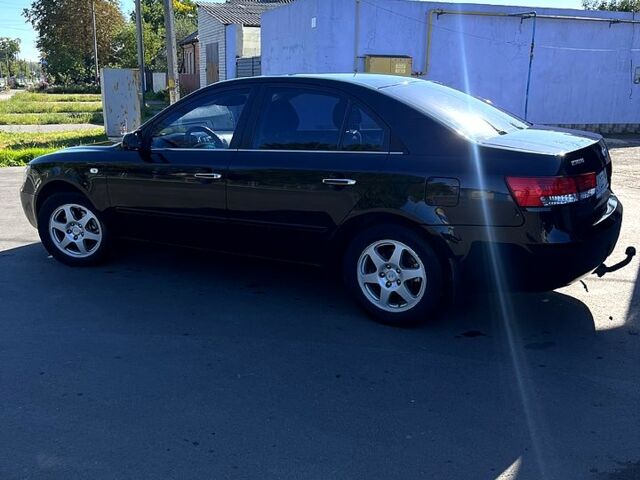 Черный Хендай Соната, объемом двигателя 2 л и пробегом 265 тыс. км за 5700 $, фото 1 на Automoto.ua