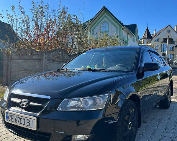 Черный Хендай Соната, объемом двигателя 2.36 л и пробегом 272 тыс. км за 5300 $, фото 1 на Automoto.ua