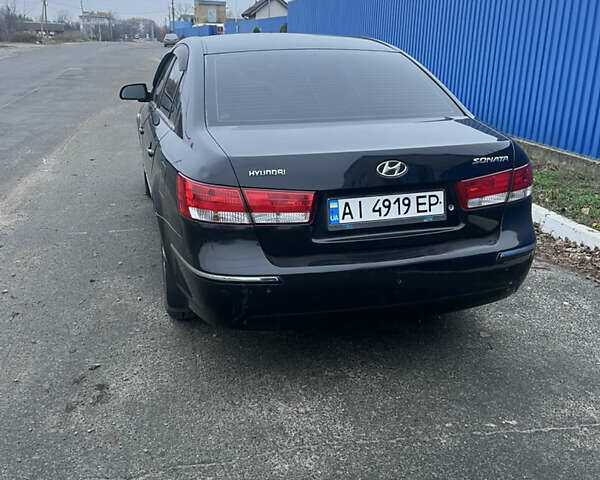 Чорний Хендай Соната, об'ємом двигуна 2.36 л та пробігом 220 тис. км за 3950 $, фото 1 на Automoto.ua