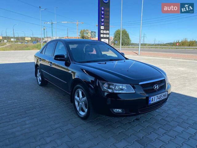 Чорний Хендай Соната, об'ємом двигуна 2.4 л та пробігом 225 тис. км за 4700 $, фото 1 на Automoto.ua