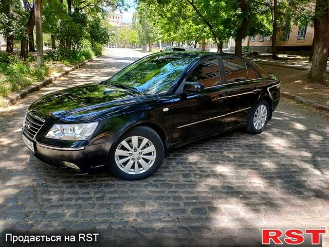 Чорний Хендай Соната, об'ємом двигуна 2.4 л та пробігом 273 тис. км за 6500 $, фото 1 на Automoto.ua