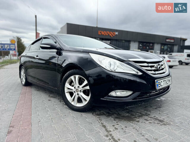 Черный Хендай Соната, объемом двигателя 2 л и пробегом 320 тыс. км за 4950 $, фото 1 на Automoto.ua