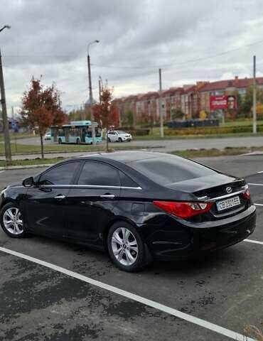 Чорний Хендай Соната, об'ємом двигуна 2.4 л та пробігом 208 тис. км за 8600 $, фото 1 на Automoto.ua