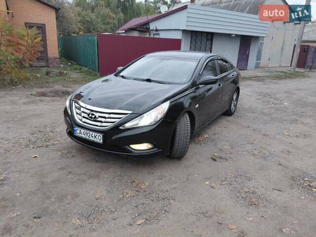 Черный Хендай Соната, объемом двигателя 2 л и пробегом 200 тыс. км за 7000 $, фото 1 на Automoto.ua