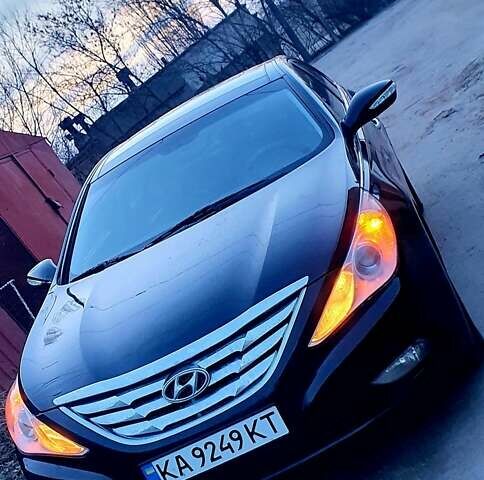 Чорний Хендай Соната, об'ємом двигуна 2.36 л та пробігом 165 тис. км за 9900 $, фото 1 на Automoto.ua