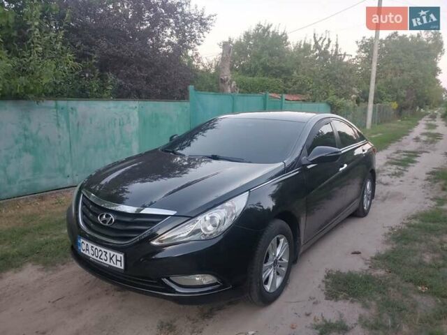 Черный Хендай Соната, объемом двигателя 2 л и пробегом 176 тыс. км за 8700 $, фото 1 на Automoto.ua