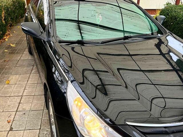 Чорний Хендай Соната, об'ємом двигуна 2 л та пробігом 215 тис. км за 9199 $, фото 1 на Automoto.ua