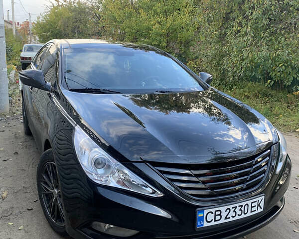 Черный Хендай Соната, объемом двигателя 2.36 л и пробегом 235 тыс. км за 8700 $, фото 1 на Automoto.ua