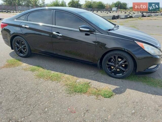 Черный Хендай Соната, объемом двигателя 2.36 л и пробегом 100 тыс. км за 8500 $, фото 1 на Automoto.ua