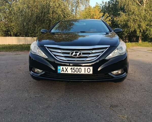 Черный Хендай Соната, объемом двигателя 2.36 л и пробегом 248 тыс. км за 8500 $, фото 1 на Automoto.ua