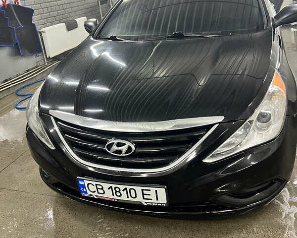 Чорний Хендай Соната, об'ємом двигуна 2.4 л та пробігом 315 тис. км за 8800 $, фото 1 на Automoto.ua