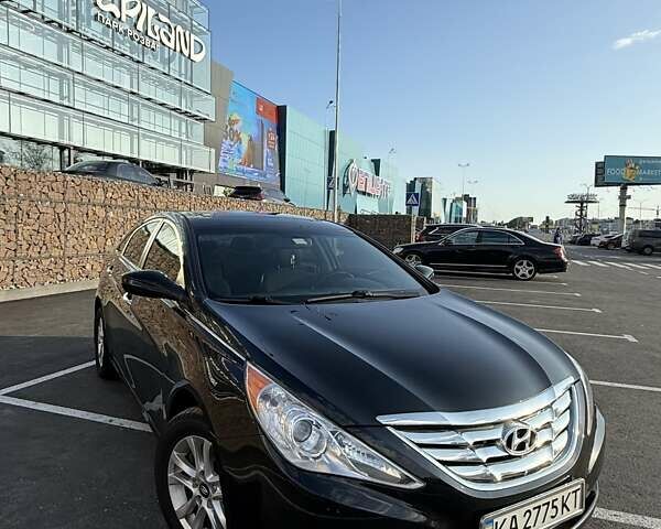 Черный Хендай Соната, объемом двигателя 2.4 л и пробегом 165 тыс. км за 10500 $, фото 1 на Automoto.ua