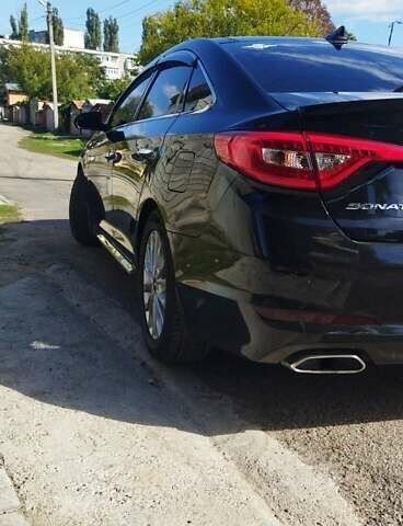 Черный Хендай Соната, объемом двигателя 2.4 л и пробегом 110 тыс. км за 13000 $, фото 1 на Automoto.ua