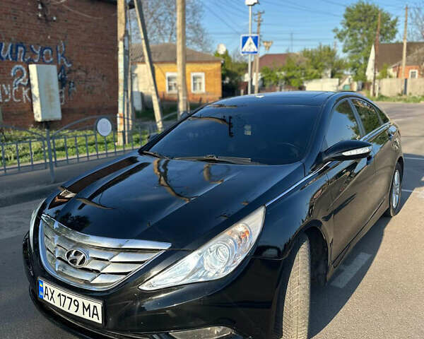 Черный Хендай Соната, объемом двигателя 2.36 л и пробегом 168 тыс. км за 8000 $, фото 1 на Automoto.ua