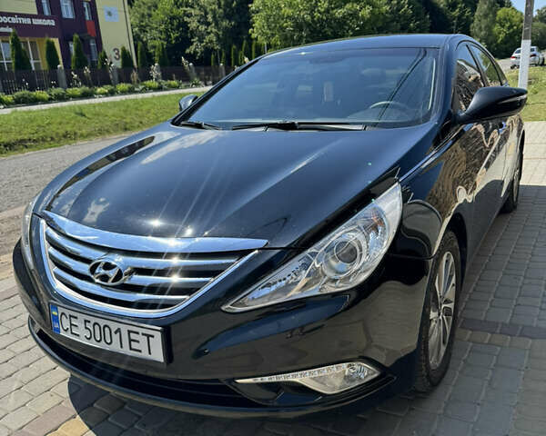 Чорний Хендай Соната, об'ємом двигуна 2.36 л та пробігом 149 тис. км за 14000 $, фото 1 на Automoto.ua