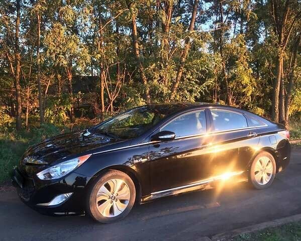 Чорний Хендай Соната, об'ємом двигуна 2.4 л та пробігом 129 тис. км за 13000 $, фото 1 на Automoto.ua