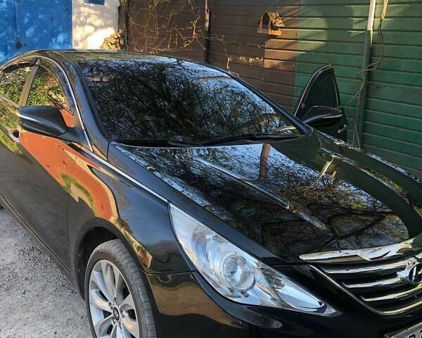 Черный Хендай Соната, объемом двигателя 2 л и пробегом 253 тыс. км за 10500 $, фото 1 на Automoto.ua