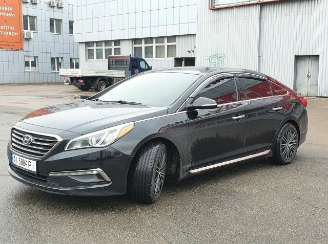 Черный Хендай Соната, объемом двигателя 2.4 л и пробегом 117 тыс. км за 13500 $, фото 1 на Automoto.ua