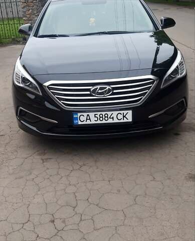 Чорний Хендай Соната, об'ємом двигуна 2.36 л та пробігом 105 тис. км за 8950 $, фото 1 на Automoto.ua
