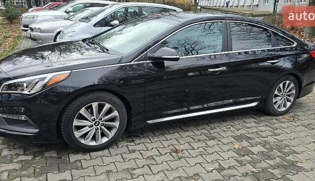 Чорний Хендай Соната, об'ємом двигуна 2.36 л та пробігом 159 тис. км за 12450 $, фото 1 на Automoto.ua